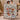Holding a personalized North Pole Village woven blanket with custom family name