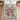 North Pole Village woven blanket spread on a bed