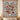 North Pole Village woven blanket displayed as a Christmas wall tapestry