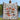 Holding a personalized North Pole Village woven blanket outdoors