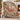 Old Saint Nicks Woodland Mail Route woven blanket draped over an armchair by the fireplace