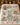 Personalized Vintage Steamboat Mickey and Minnie mint pink Christmas village fleece blanket spread across a bed
