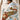 Child sleeping under a Vintage Steamboat Mickey and Minnie Christmas train fleece blanket on a bed