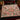Candy Cane Peppermint Forest woven blanket spread across a bed in a Christmas bedroom