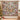 Lamplight Hollow Christmas Village woven blanket displayed as a wall tapestry