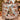 Couple holding a personalized Moose Hollow Cabin Christmas woven blanket with custom family name