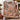 Tartan Gingerbread Squirrel Kitchen woven blanket draped over an armchair by the fireplace