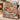 Santas Tinsel Toymaker Workshop woven blanket draped over an armchair by the fireplace