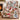 Snowman Sledding Hill Cocoa Day woven blanket draped over an armchair by the fireplace