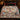 Snowman Moonlit Birch Carnival woven blanket spread across a bed in a Christmas bedroom