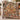 Grandmas Fireside Woodland Homecoming woven blanket draped over an armchair by the fireplace