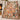 Gingerbread Cottage Squirrel Bakery woven blanket draped over an armchair by the fireplace