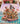 Vintage Steamboat Mickey and Minnie Christmas Riverboat Cruise fleece blanket spread across a bed in a cozy bedroom