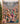 Vintage Steamboat Mickey and Minnie Christmas Jazz Ballroom fleece blanket spread across a bed in a cozy bedroom