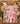 Mom and child holding a personalized Snoopy and Peanuts Gang Pink Christmas Skating Party fleece blanket with custom name