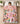 Child sleeping under a personalized Snoopy and Peanuts Gang Pink Christmas Skating Party fleece blanket with custom name