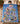Child sleeping under a personalized Snoopy and Peanuts Gang Ice Palace Christmas Parade fleece blanket with custom name