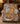 Classic Winnie the Pooh Treehouse Christmas Tea Party fleece blanket draped over an armchair by the fireplace