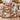 Snoopy Christmas Plaid Gift-Wrap fleece blanket draped over a sofa