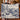 Couple holding a personalized Lighthouse Keeper's Christmas woven blanket with custom family name