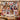 Scandi Paper Star Christmas photo blanket with family photos hanging on the wall