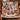 Scandi Paper Star Christmas family photo fleece throw draped over an armchair