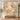 Personalized Iris & Dragonfly Reverie quilt with sample family name hung on a wall above a bench with 2 matching pillowcases