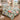 Camellia & Blue Tits quilt bedding set with 2 matching pillowcases on a bed in a cozy bedroom
