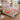 Poppy & Moth Reverie quilt bedding set with 2 matching pillowcases on a bed in a cozy bedroom