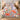 Poppy & Moth Reverie comforter set with 2 matching pillowcases on a bed in a warm bedroom