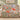 Poppy & Moth Reverie woven blanket draped over a white sofa
