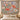 Poppy & Moth Reverie woven blanket hung as a wall tapestry above a bed