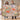 Couple holding a personalized Poppy & Moth Reverie woven blanket with sample first names in a living room