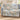 Magnolia & Swallows woven blanket draped over a sofa in a bright living room