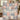 Grandma holding a personalized Toile Grandma Garden Patchwork woven blanket with grandkids names