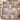 Gigi Toile Grandma Garden Patchwork woven blanket draped over a chair