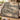 Walden Pond Cabin woven blanket draped over a sofa in a warm living room