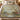 Painted Bunting Dogwood woven blanket spread across a bed in a cozy bedroom