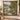 Buttonbush Mill Race woven blanket displayed as a wall tapestry