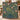 Woman holding a personalized Dog Rose Cowslip woven blanket with custom family name