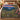 Smoky Mountain Firefly Ridge woven blanket spread across a bed in a cozy bedroom
