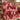Personalized Minnie Mouse quotes diamond patchwork fleece blanket draped over a nursery armchair