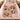 Personalized A Thousand Little Joys pet memorial fleece blanket with custom photos and the name COOPER, spread on a bed