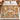 Golden Terracotta Meadow: Terracotta floral woven blanket across a bed, with six name patches and a Mom & Dad plaque reading "The heart of our family."