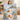 Girl holding a personalized classic Winnie the Pooh and Eeyore snow house fleece blanket with sample name AVA