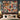 Personalized Hearthside Christmas patchwork woven blanket with sample family name hung as a wall tapestry above a bed