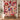 Personalized Rosewood Keepsakes Christmas patchwork quilt with sample family name hung on a wall