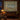 Birch Lake Wildflower Meadow woven blanket displayed as a wall tapestry above a cabin desk