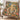 Golden Pavilion Jungle Cheetah woven blanket draped over an armchair