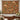 Terracotta Acanthus Hearth Morris Style woven blanket displayed as a wall tapestry